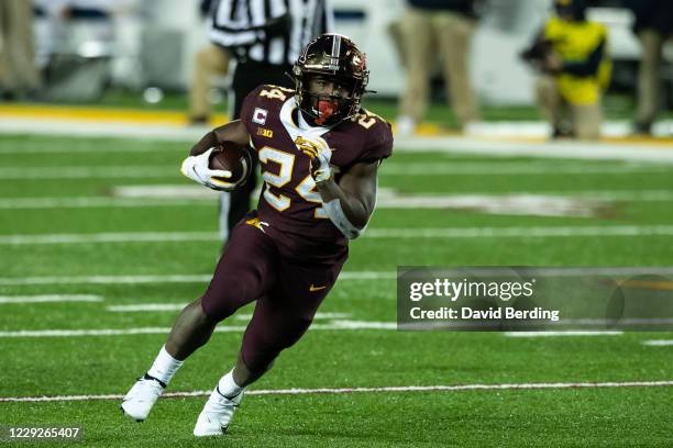 Mohamed Ibrahim of the Minnesota Golden Gophers carries the ball against the Michigan Wolverines in the first quarter of the game at TCF Bank Stadium...