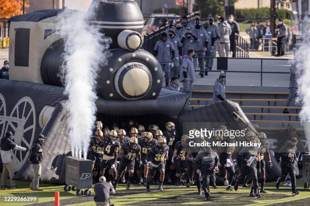 Members of the Purdue Boilermakers take the field before the game against the Iowa Hawkeyes at Ross-Ade Stadium on October 24, 2020 in West...