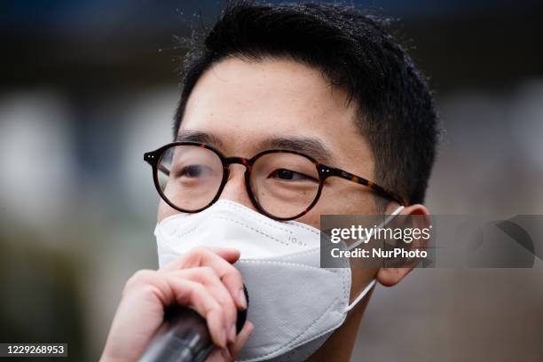 Exiled Hong Kong pro-democracy activist Nathan Law addresses a 'Save 12 HK Youths' rally at Potters Fields Park beside Tower Bridge in London,...