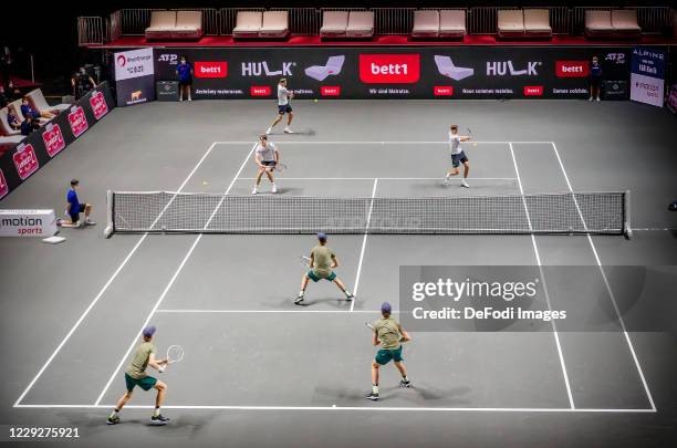 Alexander Zverev of Germany and Jannik Sinner of Italy look on during day six of the Bett1Hulks Championship tennis tournament at Lanxess Arena on...