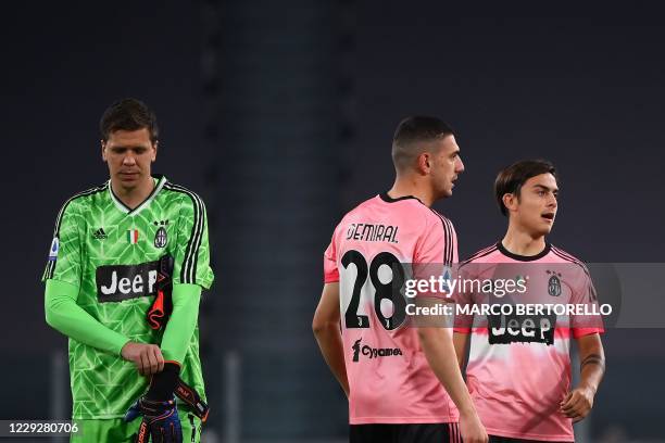 Juventus' goalkeeper Wojciech Szczesny from Poland , Juventus' defender Merih Demiral from Turkey and Juventus' forward Paulo Dybala from Argentina...