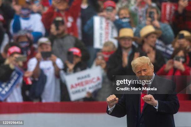 President Donald Trump dances to the song YMCA after speaking at a rally on October 26, 2020 in Lititz, Pennsylvania. With 8 days to go before the...