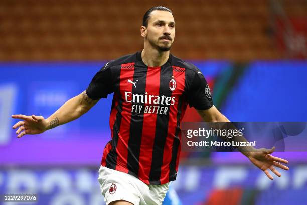 Zlatan Ibrahimovic of AC Milan celebrates after scoring the opening goal during the Serie A match between AC Milan and AS Roma at Stadio Giuseppe...