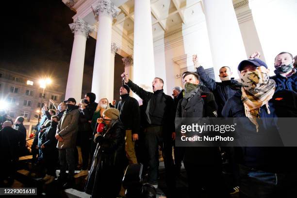 Robert Bakiewicz , a far-right nationalist leader is seen shoutings slogans while blocking the entrance to the Three Crosses church in Warsaw, Poland...