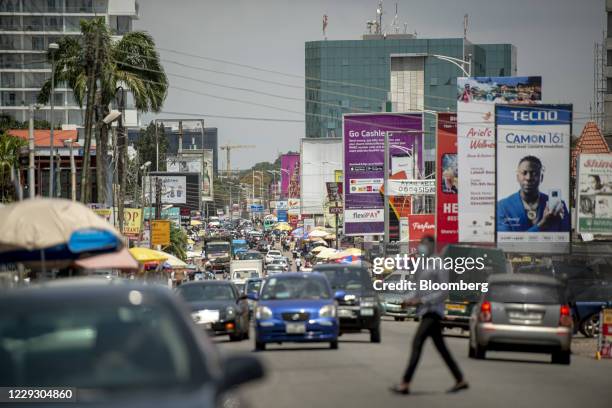 Vehicles travel along a road in Accra, Ghana, on Tuesday, Oct. 23, 2020. Ghana is missing out on a rally of African bonds as investors fret about an...