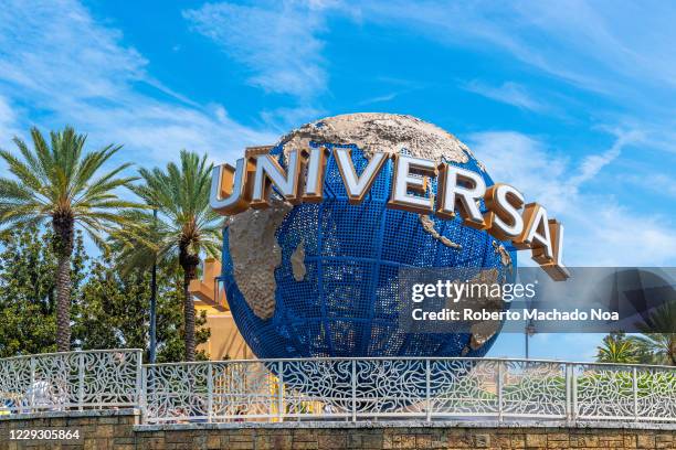 Three dimensional globe logo at Universal Studios. Low angle view from the water.