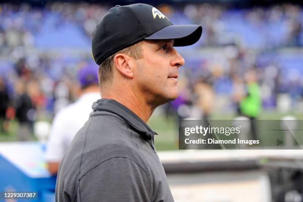 Head coach John Harbaugh of the Baltimore Ravens walks off the field after a game against the Pittsburgh Steelers at M&T Bank Stadium on December 27,...