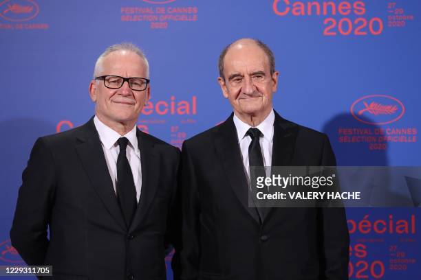 Cannes film festival general delegate Thierry Fremaux and French director of the Cannes film festival Pierre Lescure pose as they arrive at the...