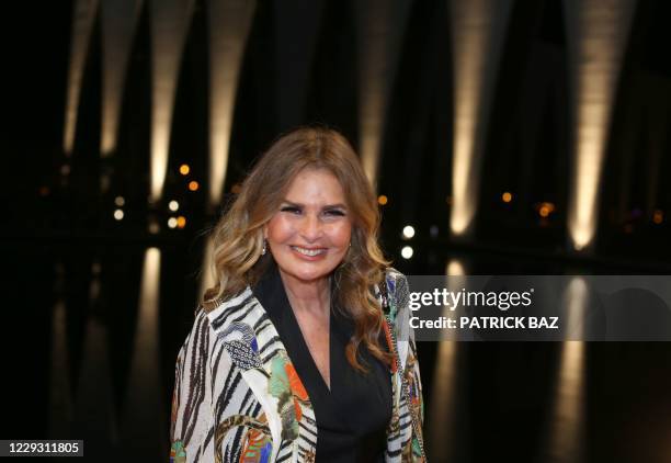 Egyptian actress Yusra walks the red carpet of the 4th edition of the El-Gouna Film Festival in the Red Sea resort of El-Gouna on October 27, 2020. /...