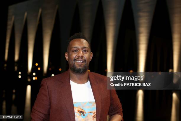 Sudanese Film maker Abu Alala walks the red carpet of the 4th edition of the El-Gouna Film Festival in the Red Sea resort of El-Gouna on October 27,...