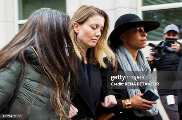 Former members of NXVIUM Linda Chung , Nicki Clyne and Michelle Hatchette leave the New York court after Rainiere was sentenced to 120 years in...