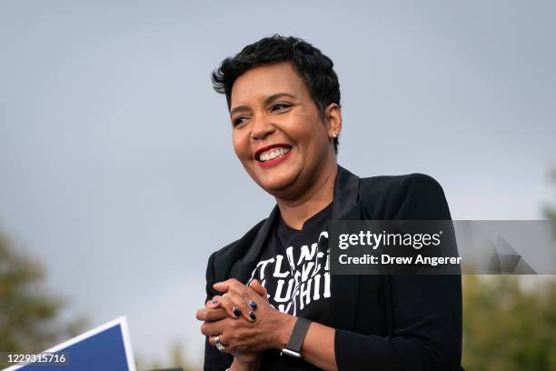 Atlanta Mayor Keisha Lance Bottoms speaks before Democratic presidential nominee Joe Biden during a drive-in campaign rally in the parking lot of...