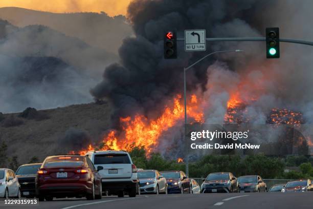 Traffic is diverted off of the 71 freeway during the Blue Ridge Fire on October 27, 2020 in Chino Hills, California. Strong Santa Ana Winds gusting...