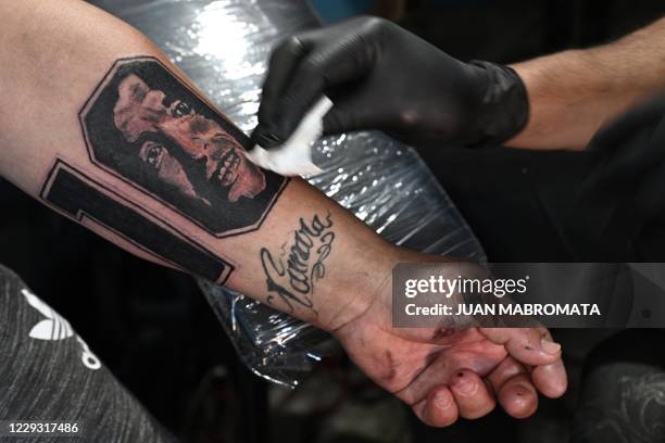 Pizza man Guillermo Rodriguez, baptized in the Maradonian church, has a new tattoo with an image of Argentinian football legend Diego Maradona done...