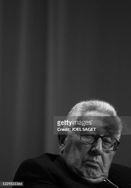 Henry Kissinger listens Pakistani President Pervez Musharraf during a session at the World Economic Forum in Davos 24 January 2008. The annual Davos...