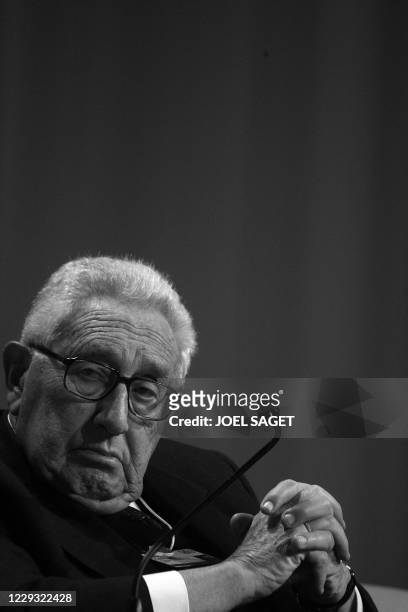 Henry Kissinger listens Pakistani President Pervez Musharraf during a session at the World Economic Forum in Davos 24 January 2008. The annual Davos...
