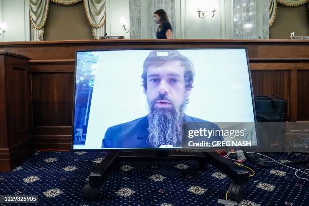 Twitter CEO Jack Dorsey gives his opening statement remotely during a hearing to discuss reforming Section 230 of the Communications Decency Act with...