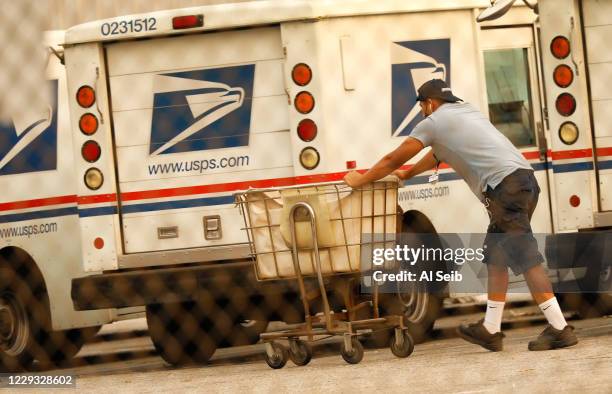Usps Mail Load Usps Mail Carrier Photos and Premium High Res Pictures - Getty Images