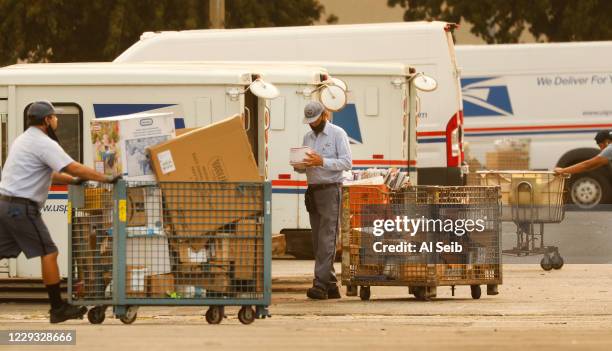 Usps Mail Load Usps Mail Carrier Photos and Premium High Res Pictures - Getty Images