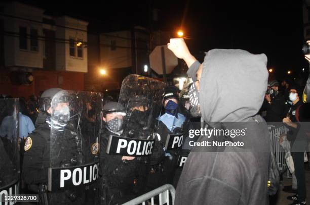 Protesters confront police outside of the 18th Police Precinct at 55th street and Pine Street in West Philadelphia, PA on October 27, 2020.Protests...