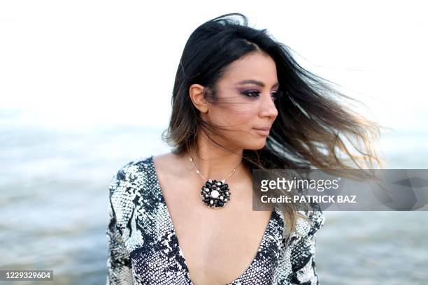Tunisian actress Sarah Hannashi poses during a photo shoot at the El Gouna Film Festival in the Red Sea southern resort of El Gouna, on October 28,...