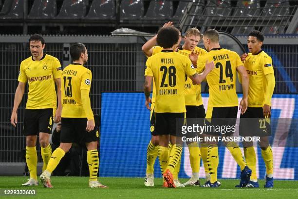 Dortmund's Norwegian forward Erling Braut Haaland celebrates scoring with the 2-0 goal his team-mates during the UEFA Champions League group F...