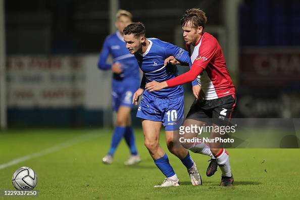 Hartlepool United's Luke Molyneux in action with Altrincham's Andy News  Photo - Getty Images