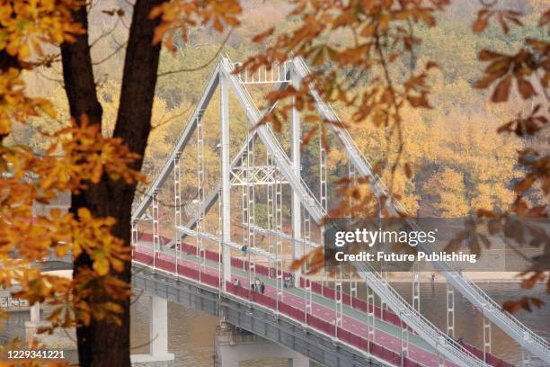 The Park Bridge, is a pedestrian bridge that connects the downtown and Trukhaniv Island, Kyiv, capital of Ukraine. - PHOTOGRAPH BY Ukrinform / Future...