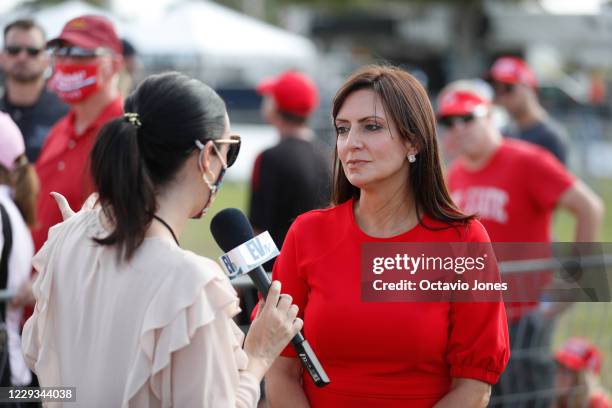 Florida Lieutenant Governor Jeanette Nuñez interviews with a TV news reporter before President Donald Trump gives a campaign speech four days before...