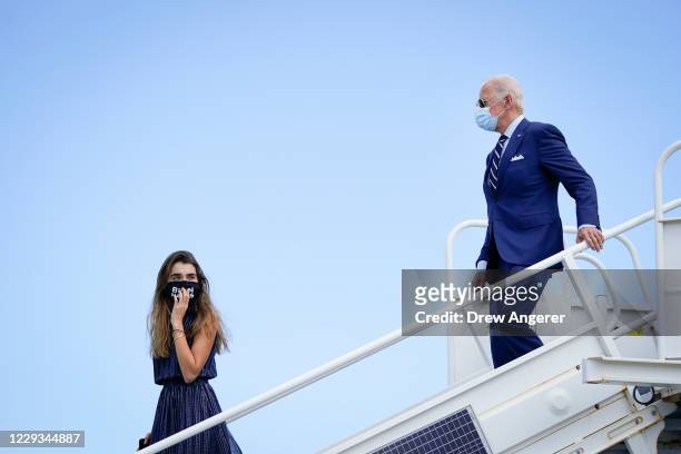 Democratic presidential nominee Joe Biden and his granddaughter Natalie Biden arrive at Fort Lauderdale-Hollywood International Airport on October...