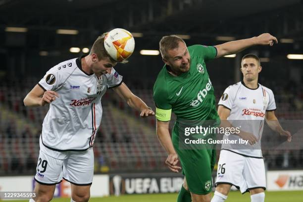 Marko Raguz of LASK and Cosmin Moti of Razgrad during the UEFA Europa League group J match between LASK and Ludogorets Razgrad at Raiffeisen Arena on...