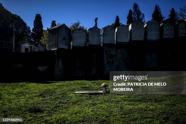 Grave is pictured at the Alto de Sao Joao cemetery in Lisbon on October 30, 2020 on the eve of All Saints' Day amid the coronavirus pandemic.