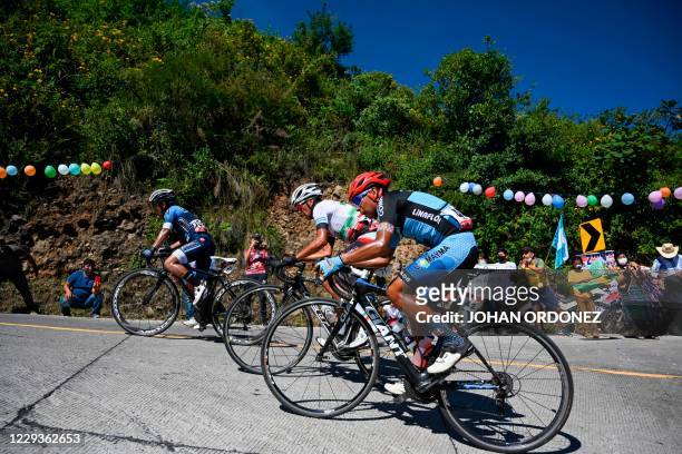 Guatemalan Juan Carlos Xajpot , Nervin Jiatz and Dimas Vail compete during the stage 8 of the Vuelta a Guatemala cycling race in San Pablo La Laguna,...