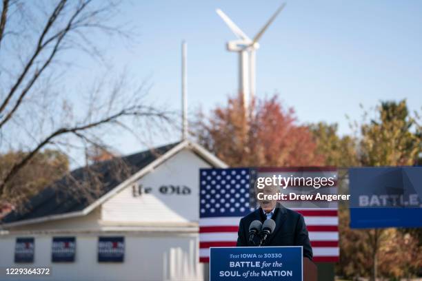 Democratic presidential nominee Joe Biden speaks during a drive-in campaign rally at the Iowa State Fairgrounds on October 30, 2020 in Des Moines,...