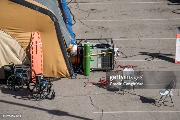 Wheelchairs and folding chairs outside a tent for coronavirus patients setup at University Medical Center on October 30, 2020 in El Paso, Texas. As...