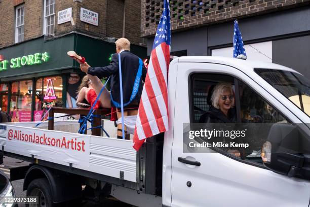 Image contains graphic material) Explicit art installation Donald Trump and Miss Universe by English artist Alison Jackson on the back of a truck in...