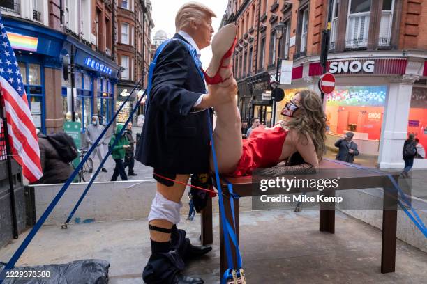 Image contains graphic material) Explicit art installation Donald Trump and Miss Universe by English artist Alison Jackson on the back of a truck in...