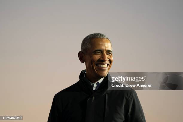 Former President Barack Obama speaks during a drive-in campaign rally with Democratic presidential nominee Joe Biden at Belle Isle on October 31,...