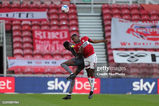 Middlesbrough's Anfernee Dijksteel contests a header with Nottingham Forest's Sammy Ameobi during the Sky Bet Championship match between...