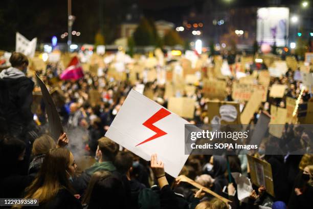 Protesters holding placards gather as they take part during the demonstration. The Polish Constitutional Court in its new, politically chosen...