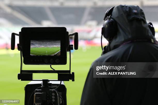 The pitch is seen through the lens of a TV camera ahead of the English Premier League football match between Newcastle United and Everton at St...