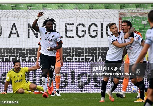 Spezia's French forward M'Bala Nzola celebrates after scoring a goal during the Italian Serie A football match between Spezia and Juventus at the...