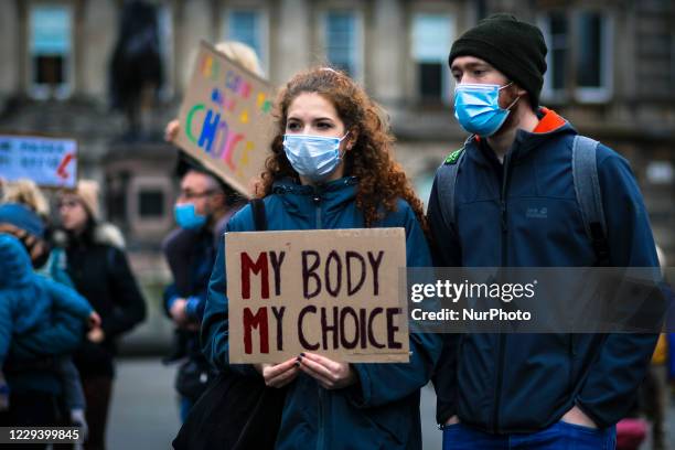 Pro-choice supporters protest against restrictions on abortion law in Poland on November 01, 2020 in Glasgow, Scotland. This comes after the...