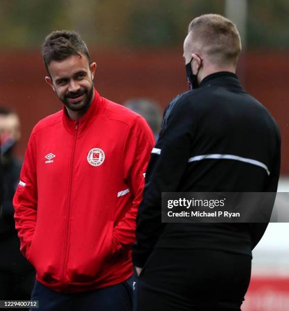 November 2020; Robbie Benson of St Patrick's Athletic in conversation with Sean Hoare of Dundalk ahead of the SSE Airtricity League Premier Division...