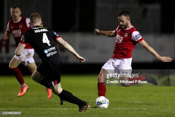 November 2020; Robbie Benson of St Patrick's Athletic in action against Sean Hoare of Dundalk during the SSE Airtricity League Premier Division match...