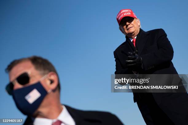 President Donald Trump arrives for a Make America Great rally at Dubuque Regional Airport on November 1 in Dubuque, Iowa. - Donald Trump vowed to...