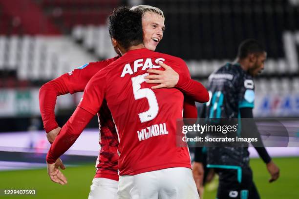 Albert Gudmundsson of AZ Alkmaar celebrates Owen Wijndal of AZ Alkmaar during the Dutch Eredivisie match between AZ Alkmaar v RKC Waalwijk at the...