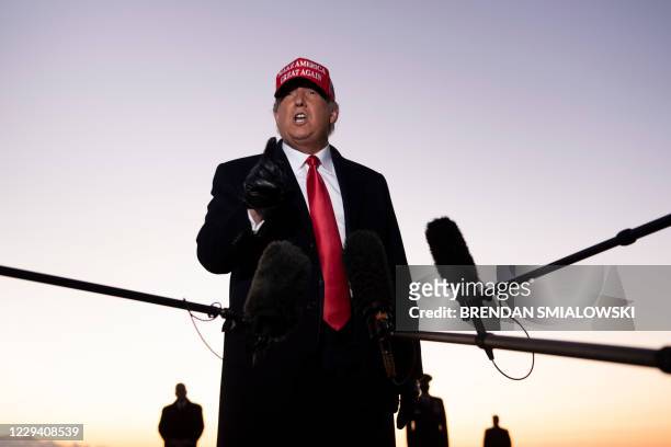 President Donald Trump speaks to the press at Charlotte Douglas International Airport on November 1 in Charlotte, North Carolina. - Donald Trump...
