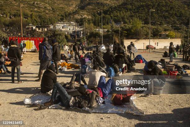 Refugees are taken to a safe place after a fire broke out in the refugee camp in Vathy in the eastern Aegean island of Samos, Greece on November 02,...
