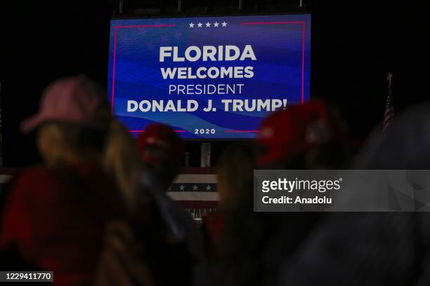 Billboard is seen during a US President Donald Trump campaing rally at Miami-Opa Locka Executive Airport in Miami, Florida, United States on November...